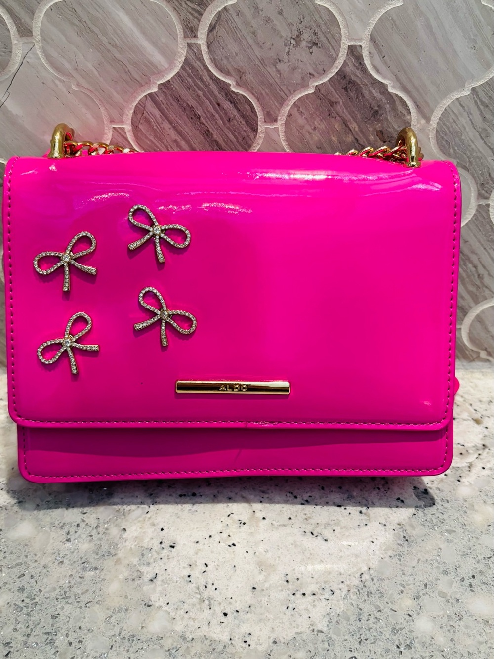 ALDO Hot Pink Patent Phone Case with Crystal Bow Accents